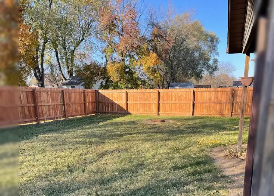 Elite Tree Service - tree removal project complete, leaving nothing but a flat stump behind